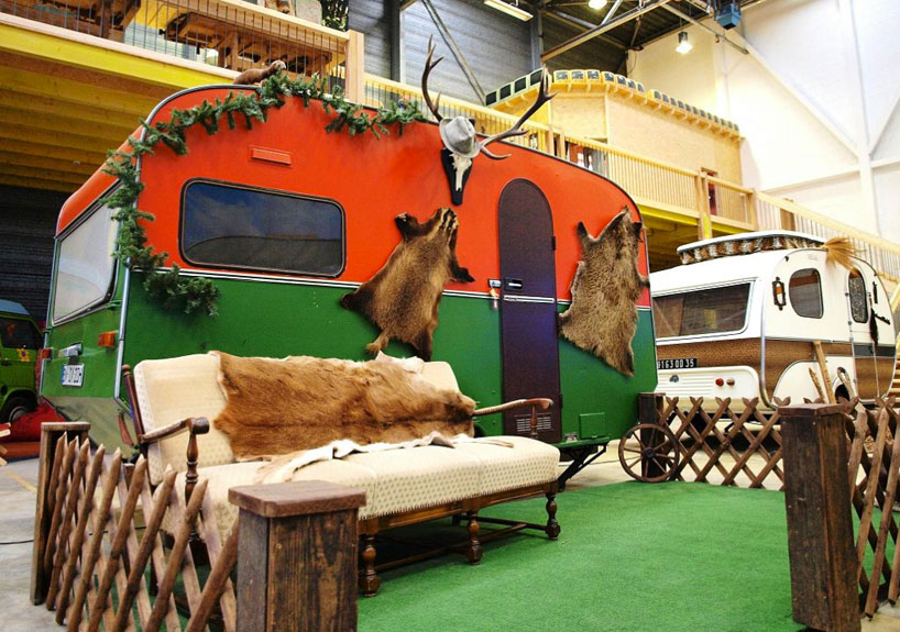indoor campground hostel hosts vintage RVs as rooms