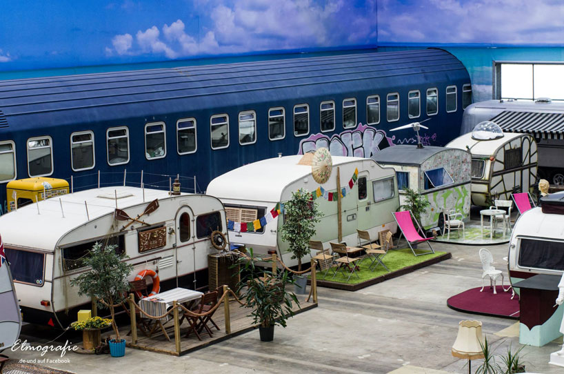 indoor campground hostel hosts vintage RVs as rooms