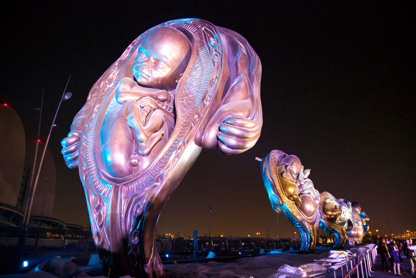 damien hirst unveils fourteen towering fetus sculptures in qatar