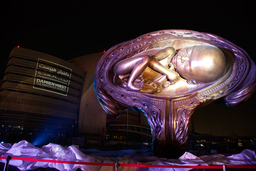 damien hirst unveils fourteen towering fetus sculptures in qatar