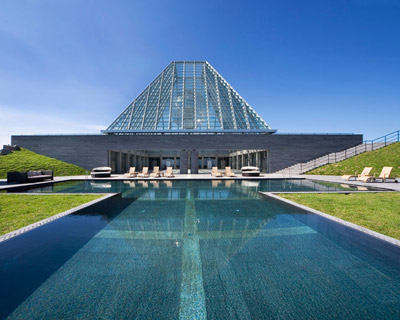 mario botta raises club house agora out of jeju island