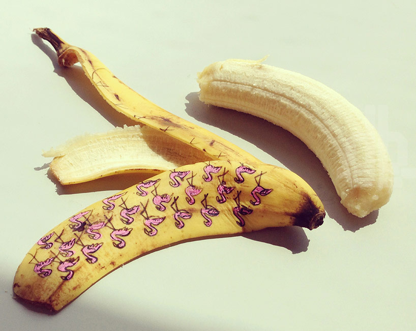 marta grossi inscribes onto temporary canvas for banana graffiti 