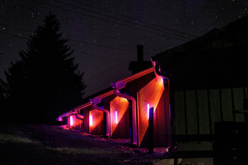 megan mosholder's glowing twine installations on barn facades