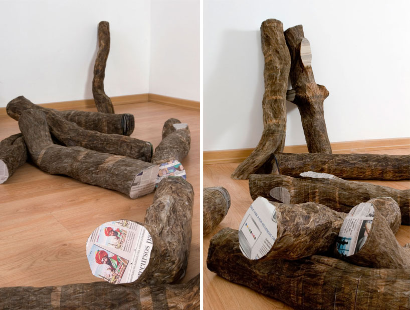 tree trunks made of densely stacked newspapers by miler lagos