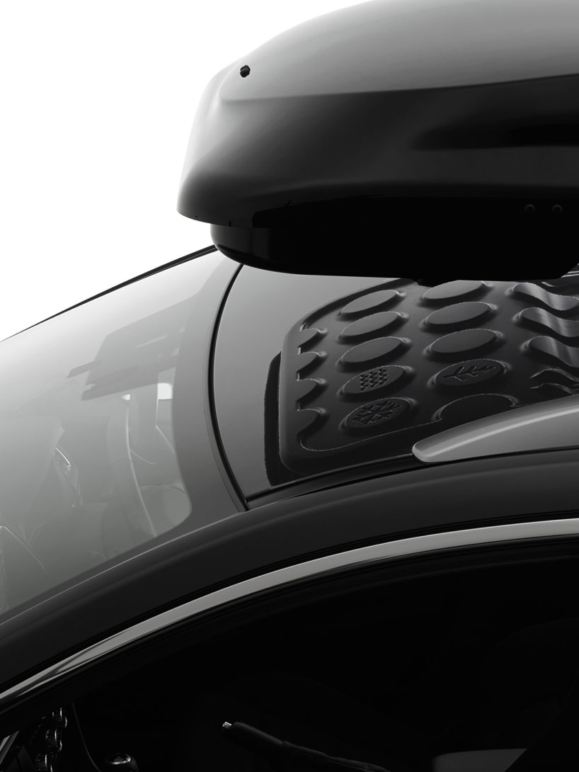 symmetrick roof cargo box for terzo car carrier by nendo