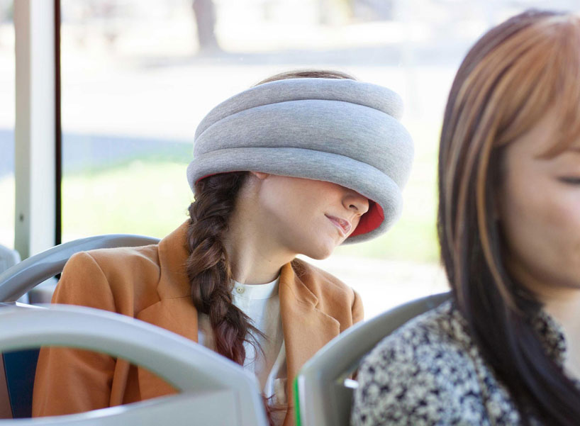 ostrich pillow light is a portable pillow for public napping