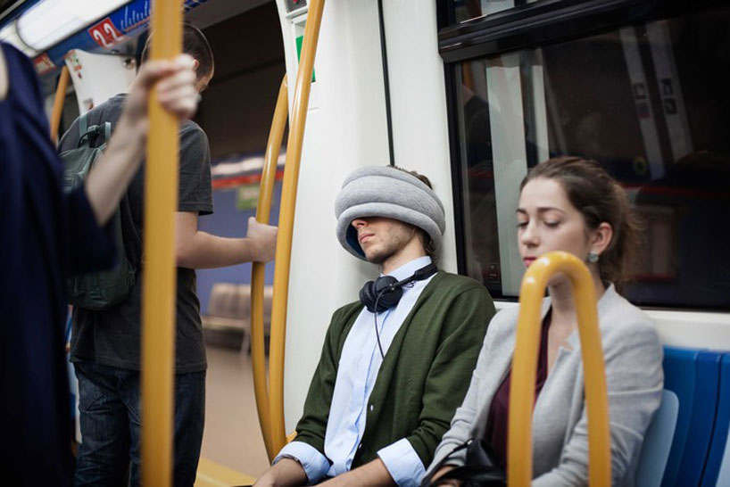 ostrich pillow light is a portable pillow for public napping