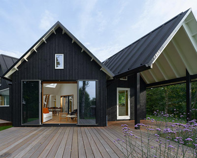powerhouse company extends village house in five directions
