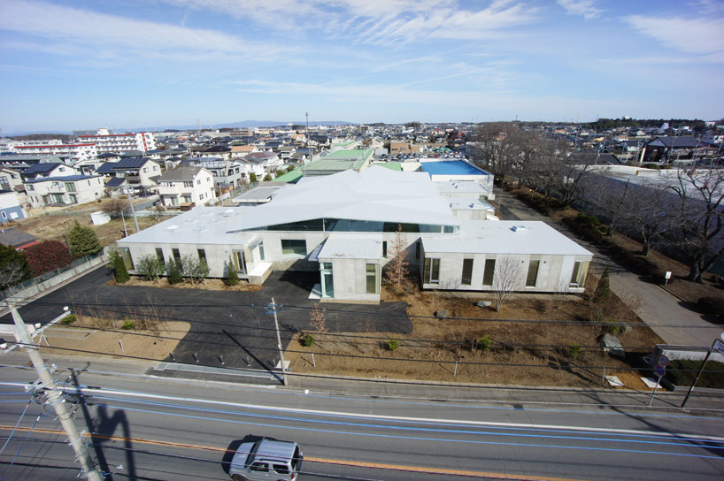 yuji tanabe and sachie isaka construct corona electric offices