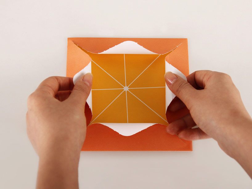 a-maze paper lets you peel away envelope for juicy mail series