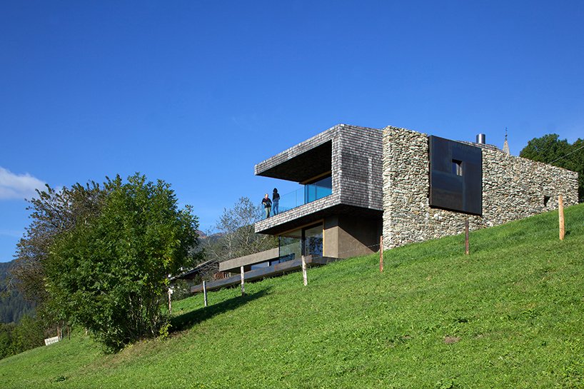 bergmeisterwolf architekten builds 'next to the chapel'