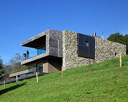 cantilevered concrete house by bergmeisterwolf emerges as a monolith ...