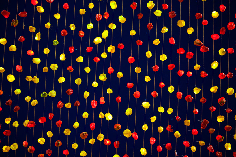 luzinterruptus illuminates the sky with light-filled peppers