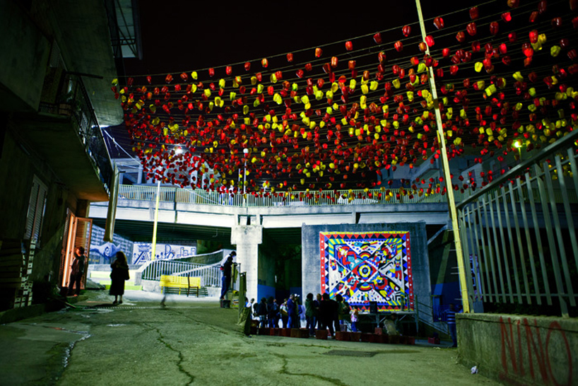 luzinterruptus illuminates the sky with light-filled peppers