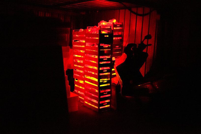 luzinterruptus illuminates the sky with light-filled peppers