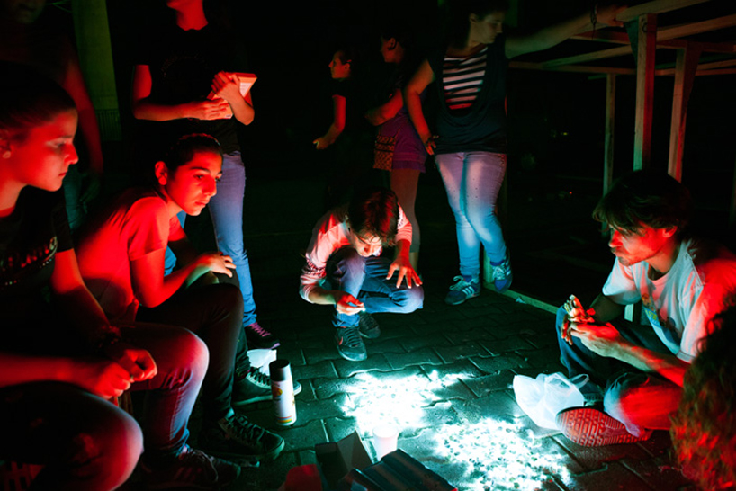 luzinterruptus illuminates the sky with light-filled peppers