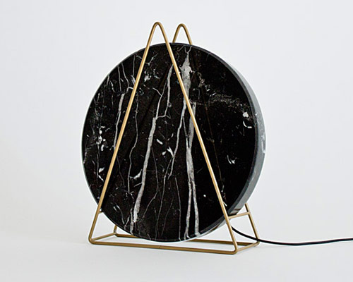 davide g. aquini places round marble in novecento table lamps