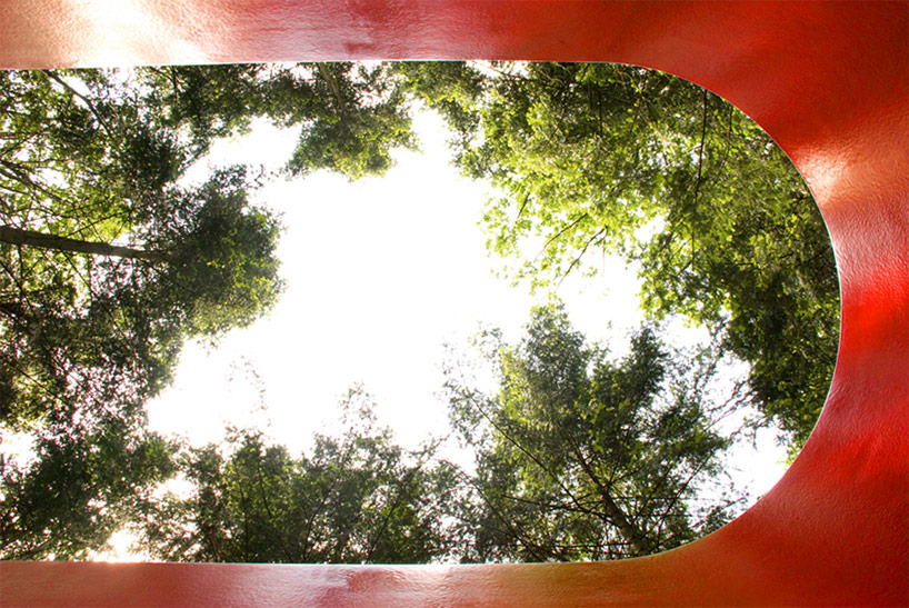 rob sweere suspends the hub in a forest