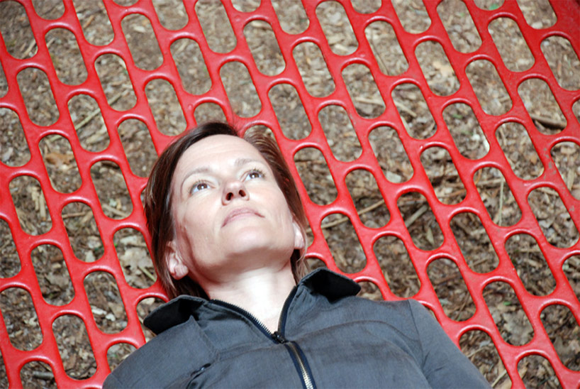 rob sweere suspends the hub in a forest