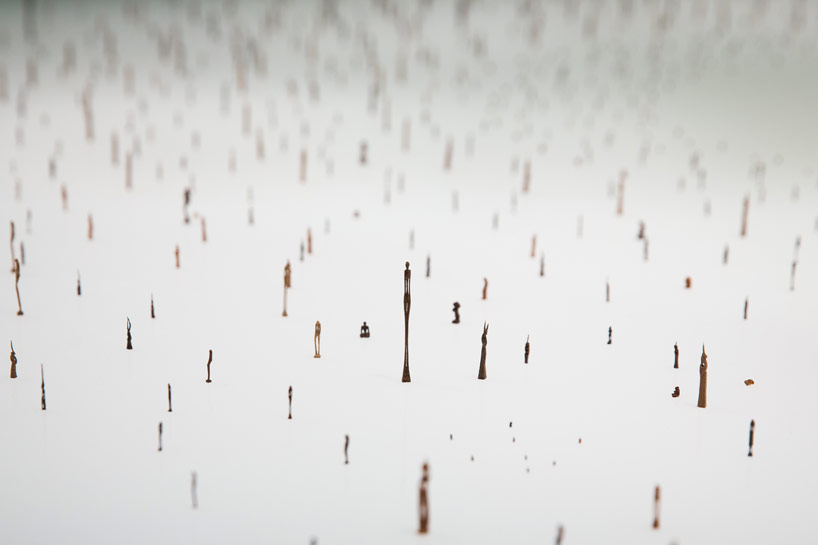 toni kanwa hand carves 1000 needle-sized wooden sculptures