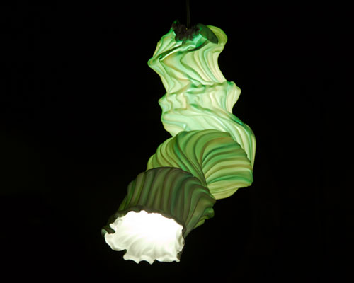 pieke bergmans blows PVC plastic to form ghostly vapor lights