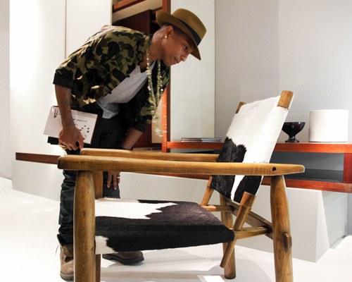 pharrell visits galerie laffanour's charlotte perriand exhibition at design miami