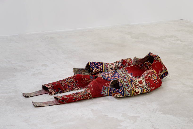 didier faustino constructs human-like figurines from carpet