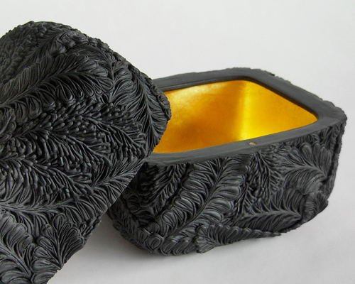 hitomi hosono intricately crafts botanical influenced ceramics