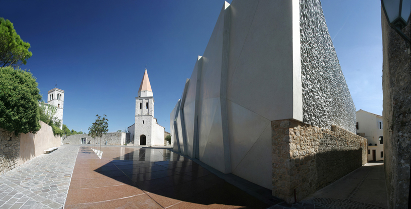 idis turato overlaps old and new with krk sports hall + square