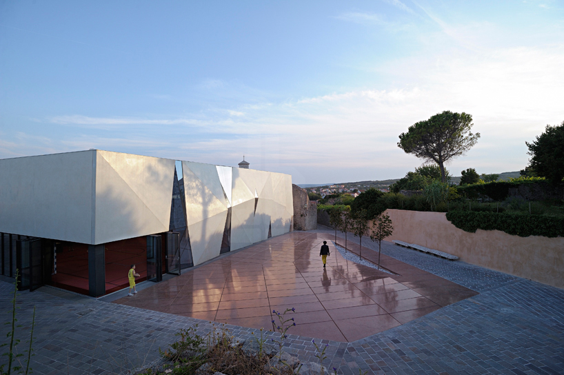 idis turato overlaps old and new with krk sports hall + square