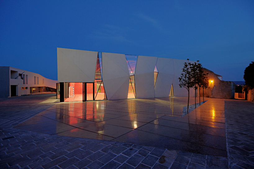 idis turato overlaps old and new with krk sports hall + square