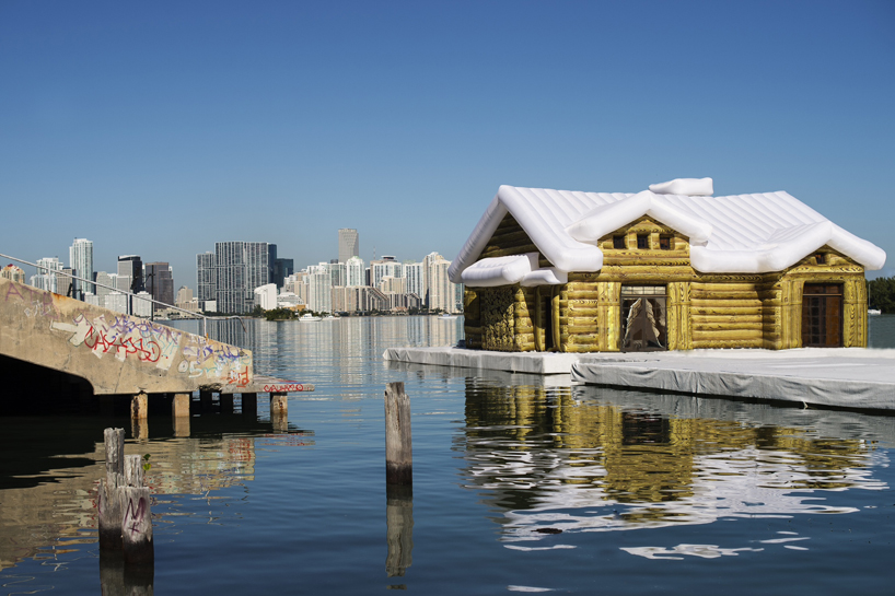 inflatable snow chalet by kolkoz floats in miami's biscayne bay
