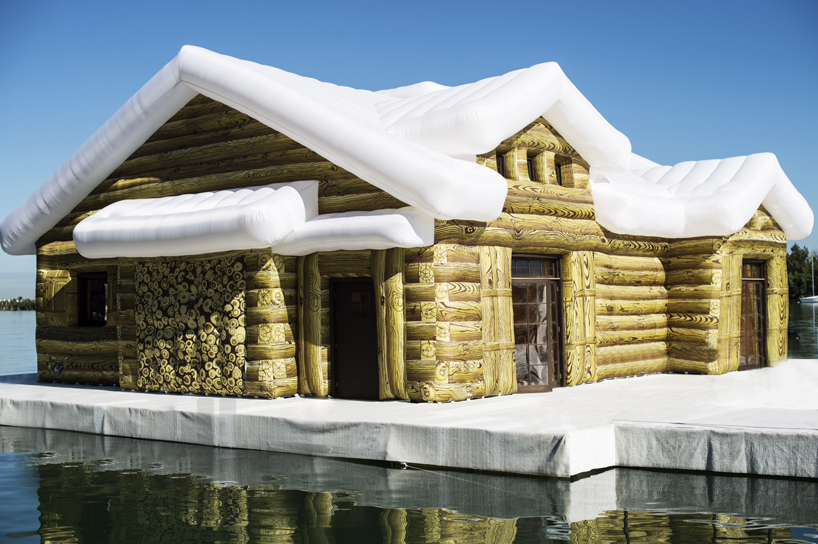 inflatable snow chalet by kolkoz floats in miami's biscayne bay