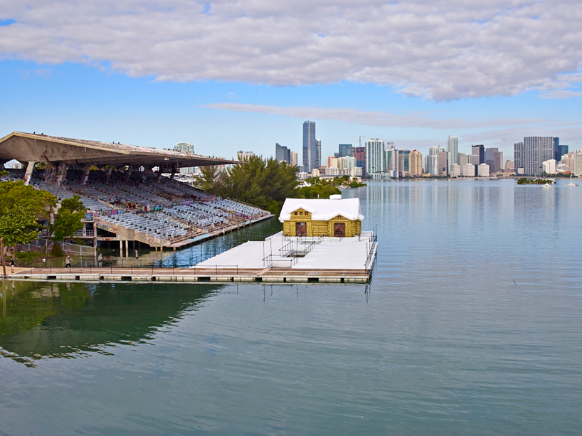 inflatable snow chalet by kolkoz floats in miami's biscayne bay