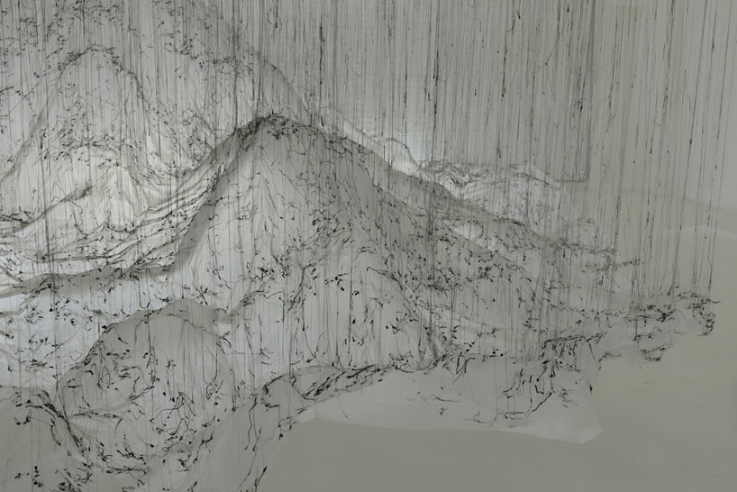 yasuaki onishi floats reverse of volume with dripping hot glue