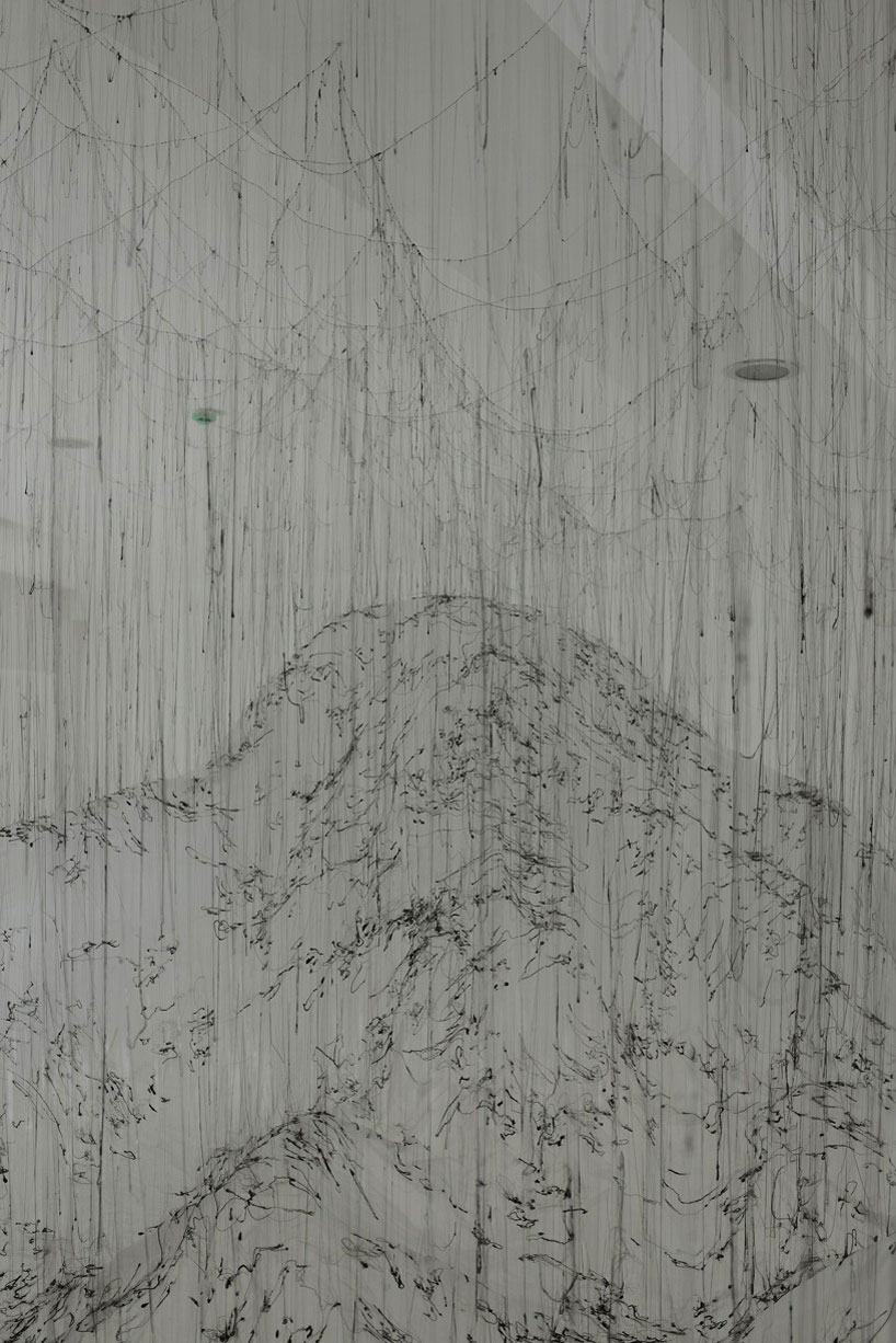 yasuaki onishi floats reverse of volume with dripping hot glue