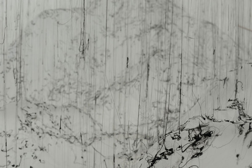 yasuaki onishi floats reverse of volume with dripping hot glue