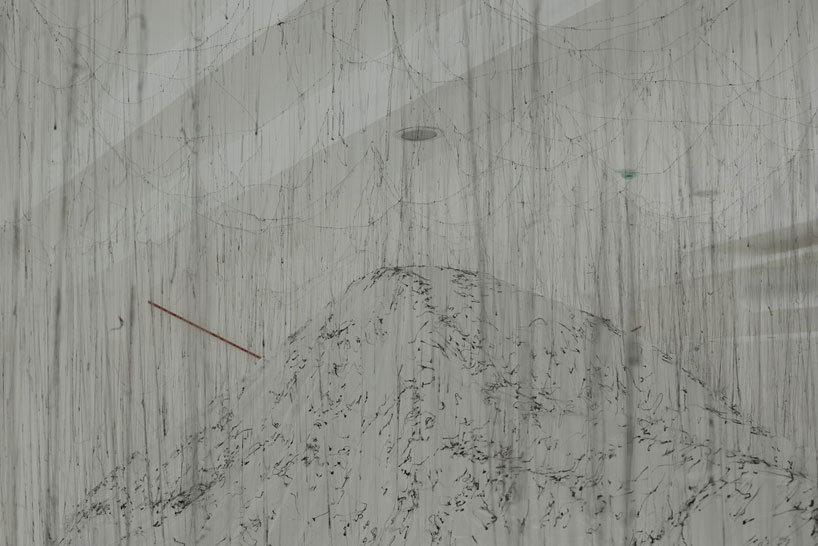 yasuaki onishi floats reverse of volume with dripping hot glue