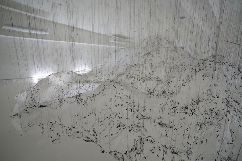 yasuaki onishi floats reverse of volume with dripping hot glue