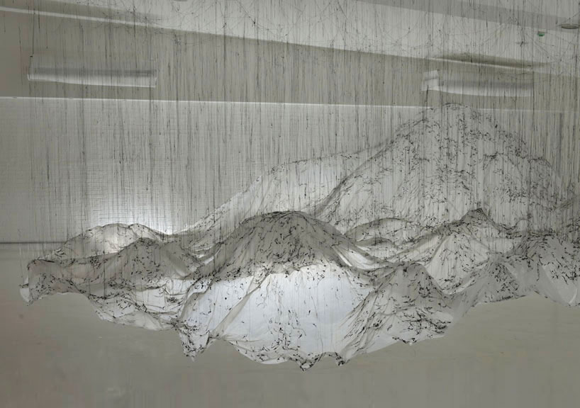 yasuaki onishi floats reverse of volume with dripping hot glue