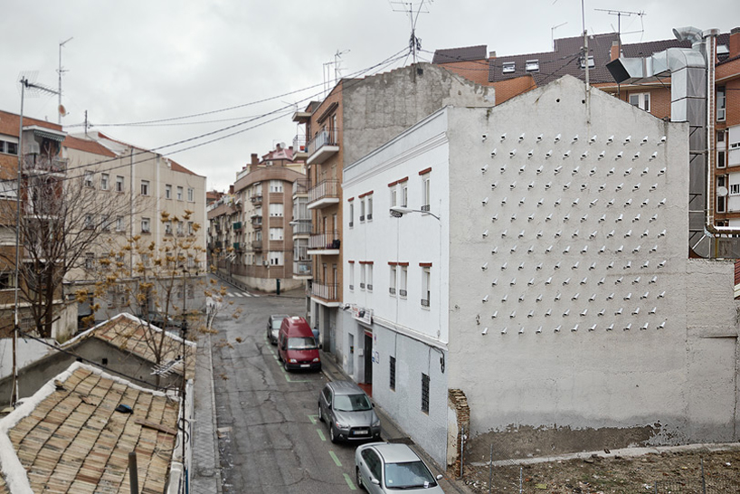 SpY installs 150 fake surveillance cameras on building facade