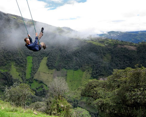 swing at the end of the world soars over tungurahua volcano