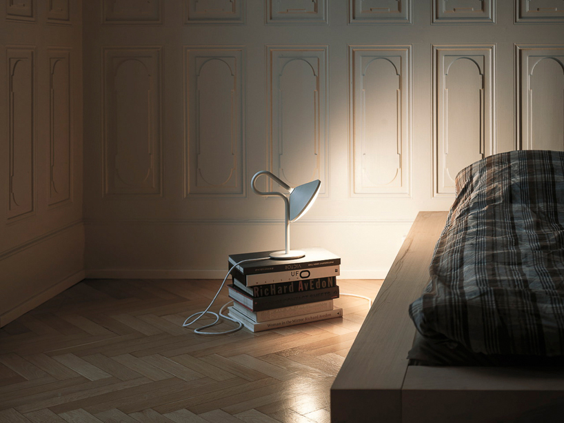bao-nghi-droste-round-table-lamp-designboom03 bao-nghi droste emits light from round table lamp's epicenter
