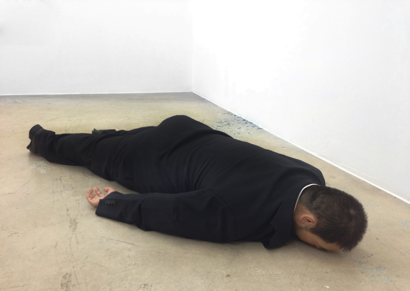 Sculpted Ai Weiwei By He Xiangyu Lies Face Down On The Ground