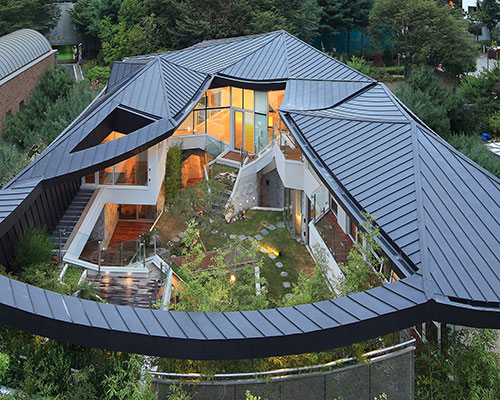 IROJE KHM architects design ga on jai house: a contemporary vernacular 