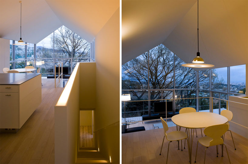 house with oak tree by maniera architects and associates