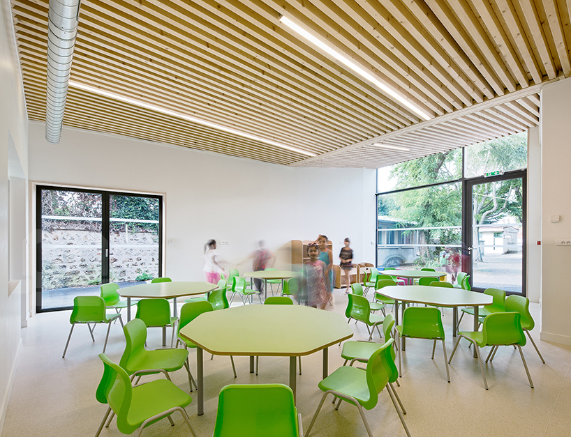 nomade-reception-and-leisure-center-designboom02 nomade fits reception + leisure center into paris schoolyard