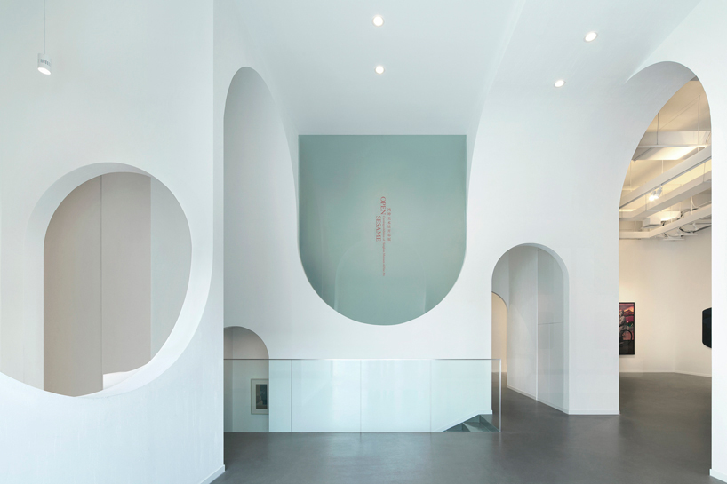 penda carves arched forms into hongkun art gallery beijing