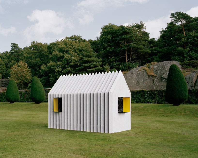white arkitekter constructs chameleon cabin entirely from paper