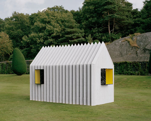 white arkitekter constructs chameleon cabin entirely from paper